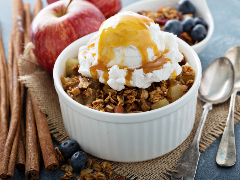 Apple crumble with vanilla ice cream served
